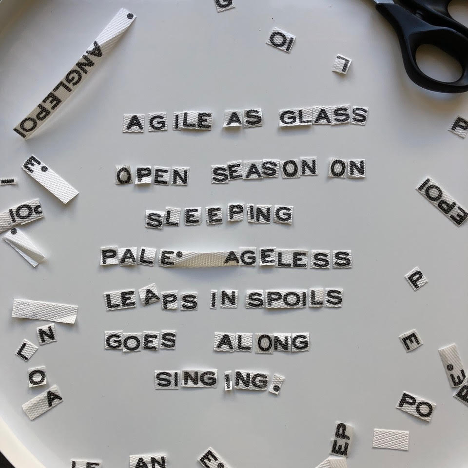 Cut-up letters and words creating a found poem